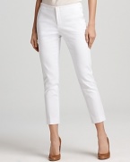 Crisp in white, these Aqua pants boast a high rise that lends itself to a smartly tucked blouse for professional polish.