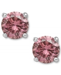 Perfection in pink. These sparkling stud earrings feature round-cut pink diamonds (1/2 ct. t.w.) in a four-prong setting of 14k white gold. Approximate diameter: 1/5 inch.