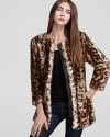 We've spotted a new fall favorite with this uber-stylish GUESS coat, enriched with a timelessly-trendsetting leopard print in plush, must-touch faux fur.