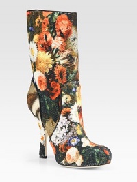 Rich floral brocade fabric trimmed with smooth leather forms this sky-high design. Self-covered heel, 5 (125mm)Shaft, 10Leg circumference, 13Brocade fabric upper with leather trimPull-on styleLeather lining and solePadded insoleMade in Italy