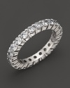 A classic diamond eternity band in 18K white gold.