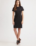 Elegant and classic, this structured design with impeccable tailoring is the perfect little black dress for any occasion. Jewel necklineShort, pleated sleevesPrincess seamsDual front slit pocketsFully linedAbout 36 from shoulder to hem52% cotton/43% nylon/5% elastaneDry cleanImportedModel shown is 5'11 (180cm) wearing US size 4.