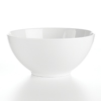 Fine porcelain dinnerware, serveware and accessory pieces made in Germany designed by Thomas for Rosenthal. White color with subtle raised white lines. Perfect for everyday use or entertaining. Dishwasher and microwave safe.