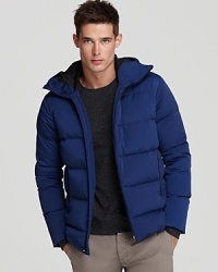 Warm (and hot), this puffer jacket adds a layer of eye-catching texture and warmth to your ensemble - try it with jeans.