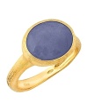 Blue sapphire is framed in 18K yellow gold on this brilliant Marco Bicego ring.