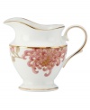 Perennial favorite. Beautiful vintage blooms on the gold-banded Painted Camellia creamer grace your table with the dramatic, yet refined, elegance of Marchesa by Lenox.