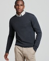 A classic crew neck sweater in a slim silhouette by Theory is rendered in a lush gray-blue.