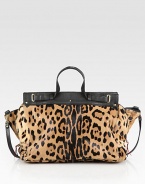 Take a walk on the wild side with this roomy shape covered in soft leopard-printed pony hair, topped off with sleek leather accents. Double leather top handles, 3¼ dropLeather shoulder strap, 12½ dropMagnetic snap closureOne inside zip pocketCotton lining21W X 11H X 8½DImported