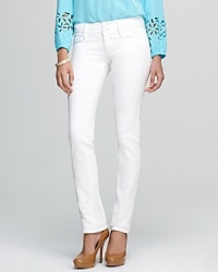 A closet essential gets a chic new edge as a crisp white palette accentuates slim Lilly Pulitzer straight jeans. Elevate the style with a razor-sharp blazer and spark some serious fashion envy.