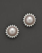 Cultured pearl stud earrings with a halo of diamonds.