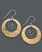 Shape up with this geometrically-savvy style. Jody Coyote's chic cut-out circles feature gold tone patina bronze and sterling silver swirls. Approximate drop: 1-1/2 inches.