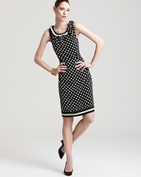 Dainty polka dots imbue this kate spade new york dress with retro charm, while a ruffled neckline lends a playful finish to the polished silhouette.