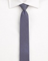 This striped tie woven in fine silk lends a debonair finish to your tailored suiting.About 2 wideSilkDry cleanImported