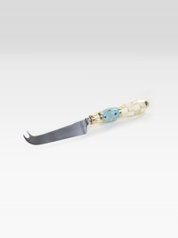 A unique serving piece in hand-painted porcelain with color-dragged checks and lustred gold accents. Porcelain with stainless steel blade8½ longHand washMade in the USA