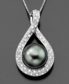 Inspirational style. This gorgeous pendant features a cultured Tahitian pearl (9-10 mm) and round-cut diamonds (1/2 ct. t.w.) set in 14k white gold. Approximate length: 18 inches. Approximate drop: 1 inch.