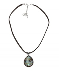 Get ready for surf and sand in Fossil's chic shell necklace. Features a teardrop-shaped abalone shell strung on a chocolate leather cord and set in silver tone mixed metal. Back of shell features a butterfly detail. Approximate length: 17 inches + 2-inch extender. Approximate drop: 2 inches.