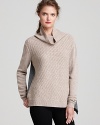 Lend depth your wardrobe with this ribbed Rebecca Taylor sweater rendered in two neutral tones for endless versatility. A truly chic piece, the soft turtleneck moves through your week with ease.