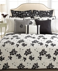 Finish your bed in stylish grace with this Port Palace bedskirt from Lauren Ralph Lauren, featuring a white floral design on a black ground.