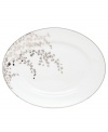 An instant classic from kate spade new york, this Gardner Street Platinum oval platter exudes contemporary elegance. Stems of platinum foliage flourish on fine white bone china, creating a stylized two-tone floral motif to freshen up your formal table.