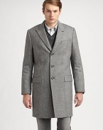 Tailored in virgin wool, this tweed overcoat is the ultimate winter wardrobe option for the dapper, gentleman of style.Button-frontChest welt, hip flap pocketsAbout 37 from shoulder to hemVirgin woolDry cleanMade in Italy