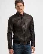 A modern approach to the classic motorcycle jacket, this soft leather style has a zippered chest pocket and a banded hem, in a washed, well-worn finish.Zip frontStand collarChest welt, waist slash pocketsBanded hemAbout 26 from shoulder to hemLeatherDry cleanMade in Italy