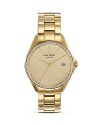 A crystal-encrusted bezel adds luxe sparkle to this gold-plated stainless steel watch from kate spade new york.