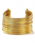 Follow the style-setters and finish every look with gleaming accessories like this chunky cuff from R.J. Graziano. Slip it on to be a true golden girl.