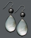 Elegance doesn't have to be demure. Add polish and punch with these bold drops featuring cultured freshwater pearl (9-9-1/2 mm) and teardrop-shaped black mother-of-pearl. Earrings set in sterling silver. Approximate drop: 2 inches.