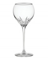 Stemware inspired by the chic London neighborhood, Wedgwood Knightsbridge wine glasses feature a delicately round shape with deep cuts around the bowl, accented with a platinum rim. The stem resembles a flower when viewed from above.