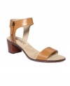 Break out the sunscreen with the Gabriella sandals by Ellen Tracy. Simple straps at the toe and ankle keep you in step, while the mid-height heel adds a touch of lift to your already chic look.