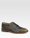 Lace-up derby crafted in grainy leather.Leather soleMade in Italy