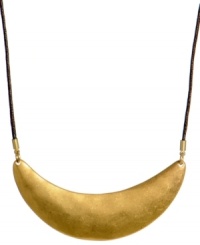 Exotic appeal. Kenneth Cole New York's modern and stylish crescent moon pendant is crafted in gold tone mixed metal and strung from a brown waxed cotton cord. Approximate length: 17 inches + 3-inch extender.