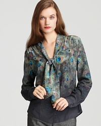 An elegant BASLER tie-neck blouse goes exotic as a statement peacock print enlivens the sumptuous silhouette.