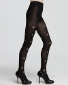 Bring on the glitz in kate spade new york's festive tights with all-over gold polka dots.