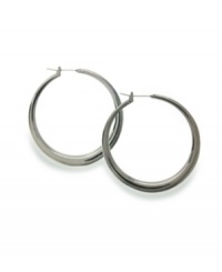 Style&co.'s tapered hoop earrings are a versatile, casually classic look that works for any time of year. Made in hematite tone mixed metal. Approximate diameter: 1-1/4 inches.