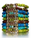 Play up your wrists. Style&co.'s head-turning beaded bracelet combines lime green, turquoise, cobalt blue and wood beading along with matching glass accents for vivacity and shine. Set in gold tone mixed metal. Bracelet stretches to fit wrist. Approximate diameter: 2-3/4 inches.