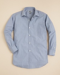 DKNY's mini-check button down shirt updates his dressy wardrobe with a versatile piece that adapts to his personal look.