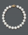 Create a look of ultimate sophistication. Decorate your wrist with this traditional bracelet crafted with AA+ cultured freshwater pearls (8-9 mm) and a 14k gold clasp. Approximate length: 8 inches.