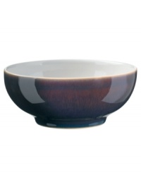 A true gem, the Amethyst cereal bowl is simply glazed but boldly hued, in deep indigo and crisp white from Denby's collection of dinnerware. The dishes can embrace their luxe color alone or they can be paired with the playful dots of Amethyst Stone for a well-balanced and uniquely customized table setting.