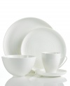 Echoing the feel of hand-thrown pottery, the contemporary Spin 5-piece place settings from Sasaki's collection of white dinnerware boasts a subtle spun etching, giving each piece its distinctive character. (Clearance)