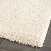 Safavieh Shag Collection SG151-1212 Ivory Shag Area Rug, 5-Feet 3-Inch by 7-Feet 6-Inch