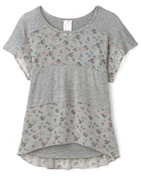 Mixing heathered blocks and floral insets, this chiffon shirt features a solid tank top undershirt built in.