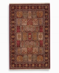 The large size of this rug makes it ideal for great rooms and other open spaces. A striking example of classic Bakhtiyari designs, this rug features organic motifs in a panel design of reds, greens and golds, finished with a rosette border. A special antique wash enhances and harmonizes the burnished colors to create a rich vintage finish. Woven in the USA of luxuriously soft premium worsted New Zealand wool.