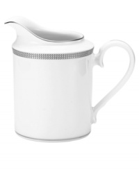 Go platinum. Solid bands and three tiers of sparkling squares in white porcelain give the Pembroke Platinum creamer a look that's festive yet refined. A brilliant addition to a contemporary dinnerware collection by Noritake.