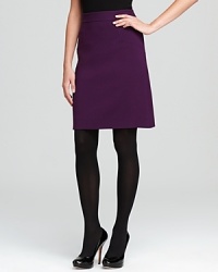 Impeccable tailoring and clean lines craft an exquisite kate spade new york skirt, rendered with a hint of dress to skim flawlessly over your curves.