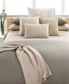 Add an extra layer of comfort to your bed with this Calvin Klein Dash Thorn quilt featuring mini waves.