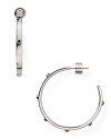 Strong but simple. This pair of silver plated hoop earrings from Michael Kors are the perfect earrings for everyday - wear them as as shapely showpiece.