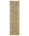 With a soft, aqua-blue center, bordered in light beige, this Nourison area rug offers a fluid color palette style for any space. Rivaling the world's finest heirloom rugs, this handcrafted piece is made with a luxuriously dense New Zealand wool pile and woven with generous portions of pure silk.