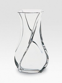 A remarkable vase crafted in France with smooth, fluid lines and a graceful shape. An elegant piece ideal for favorite flowers or nothing at all. From the Serpentin Collection 6 high Hand wash Made in France 