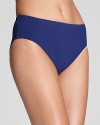 Stay sleek with a variety of top options in this form-meets-function Gottex swim bottom.